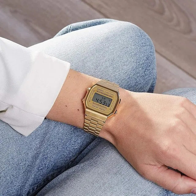 Digital Casio unisex men's watch with digital display and black strap, featuring multiple functions and a sleek design.