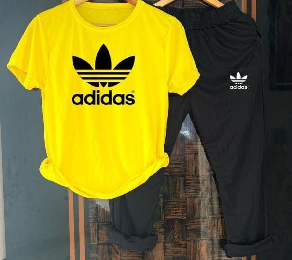Men's Adidas summer tracksuit in yellow and black, featuring a sporty design with zip-up jacket and matching pants.