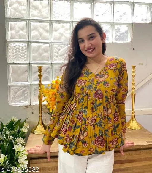 Stylish mustard floral empire top for women, comfortable daily wear kurti with vibrant print and elegant design.