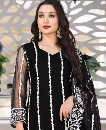 Elegant women's kurta set with matching dupatta and bottomwear, featuring intricate embroidery and vibrant colors.