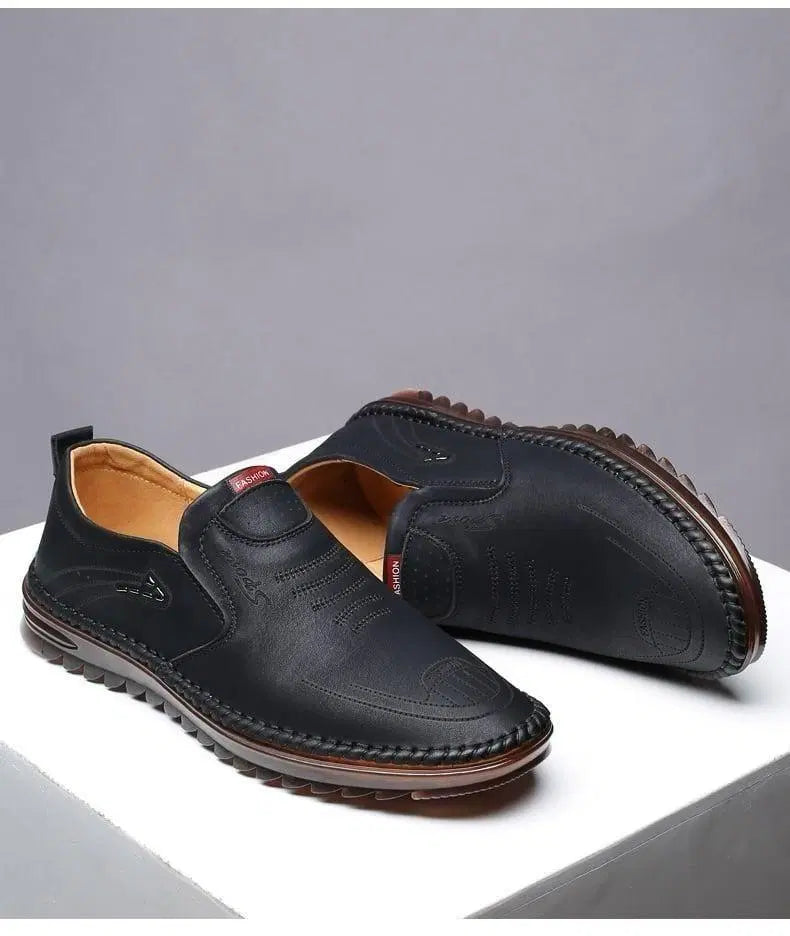 Men's Aurellia Signature Black Casual Shoes by 34608, featuring sleek design and comfortable fit, shown in close-up image.