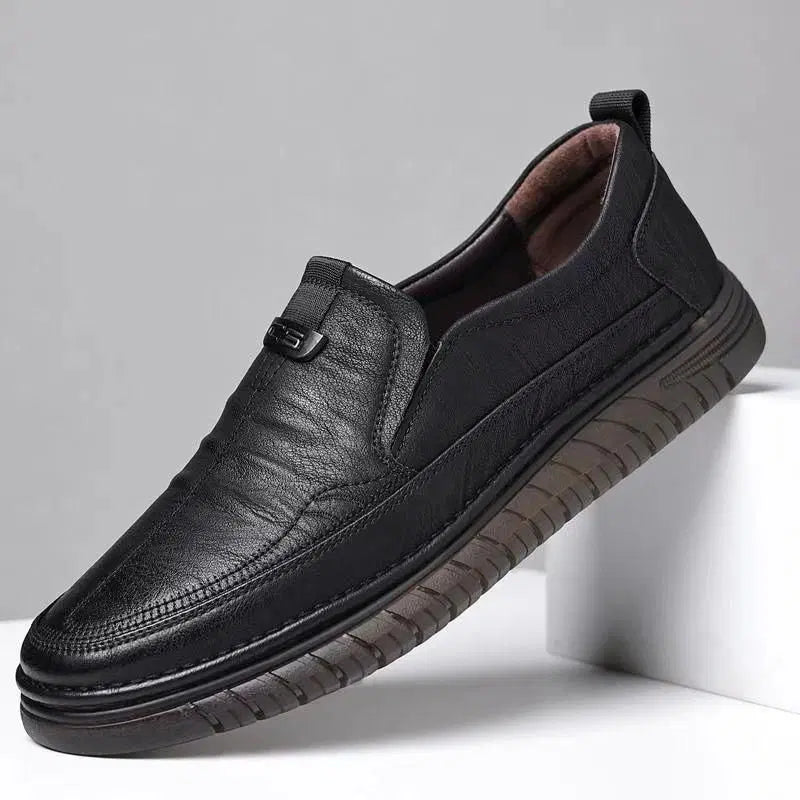 Men's black semi-formal slip-on shoes, casual style with sleek design, from brand 34608, shown on a neutral background.