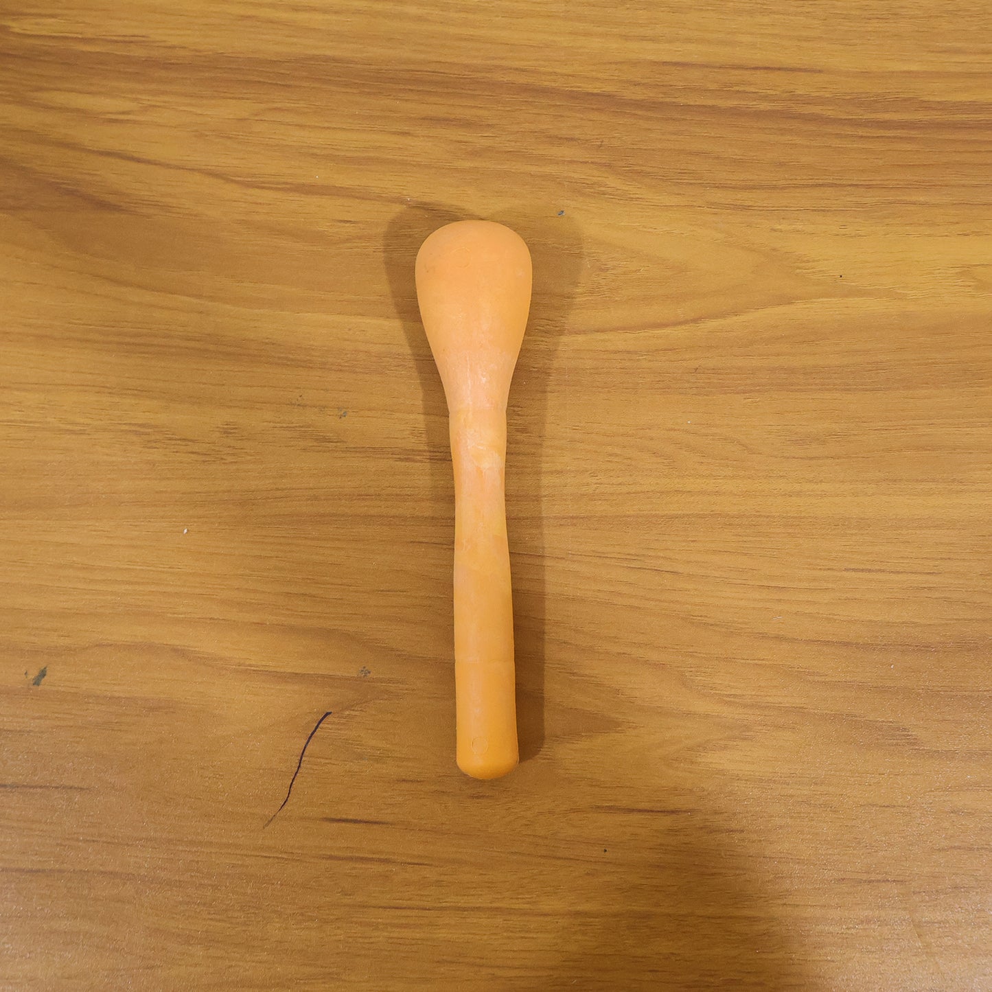 Wukusy manual masher grinder tool for kitchen use, with stainless steel handle and textured mashing surface for efficient food preparation.