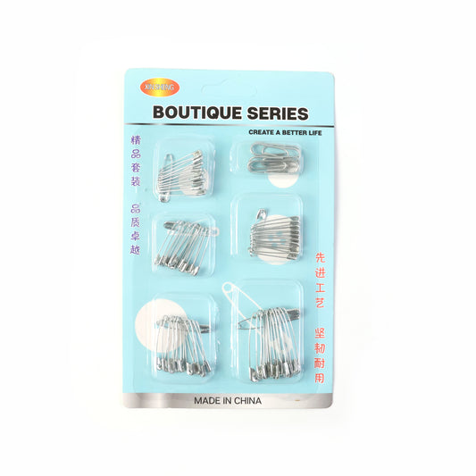 Assorted Wukusy metal safety pins in various sizes displayed in a set on a white background for versatile use.