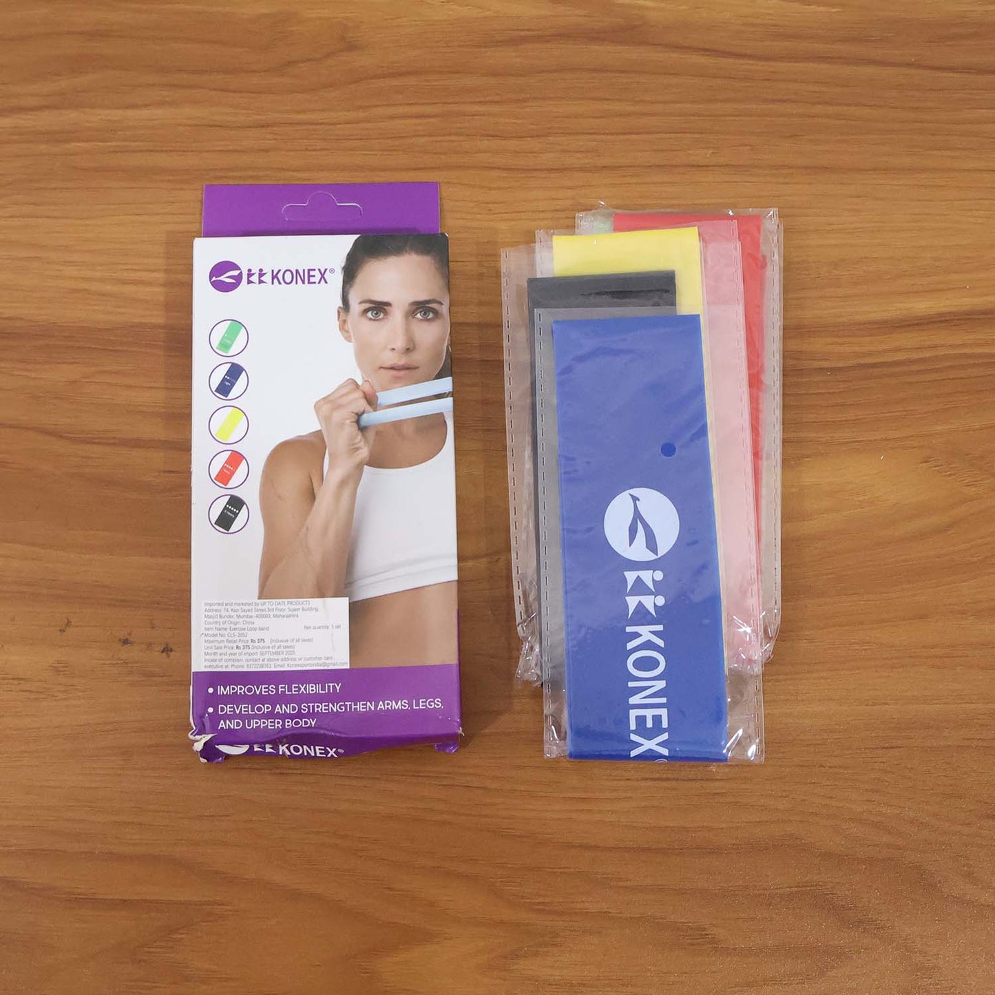 Set of five Wukusy resistance loop exercise bands for strength training and fitness workouts, shown in various colors.