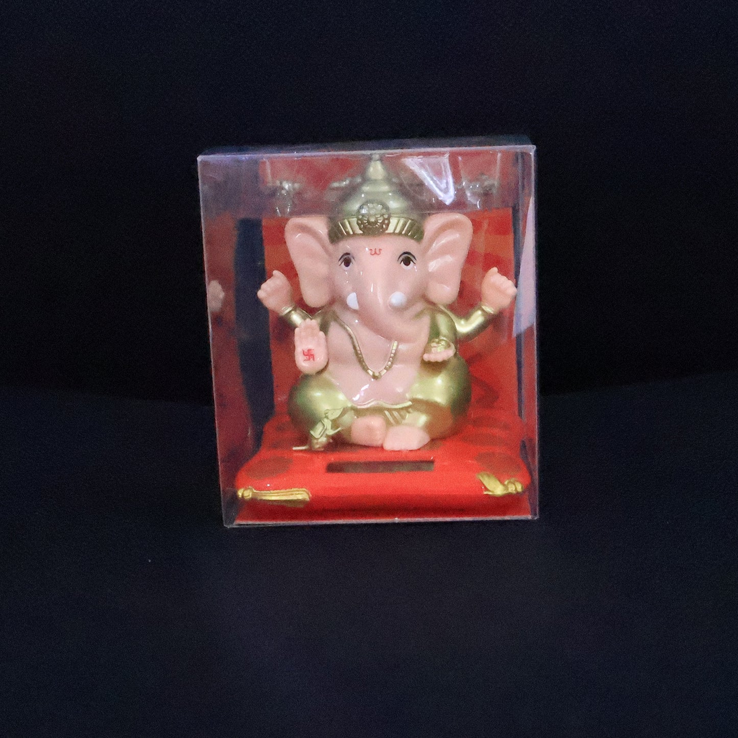 Decorative medium Lord Ganesh idol statue with solar-powered base, ideal for home decor, by Wukusy.