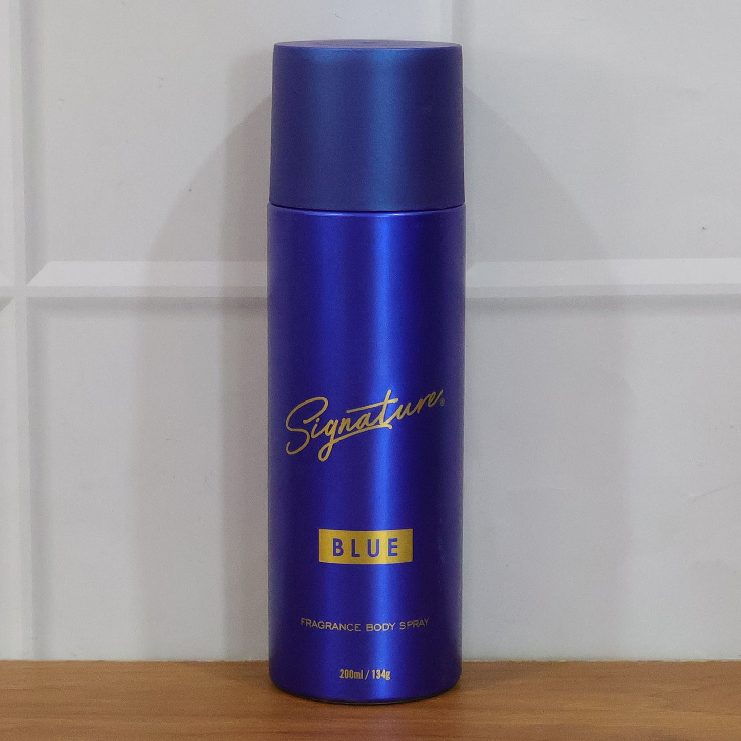 Wukusy Signature Premium Blue Fragrance Body Spray 200ml bottle with sleek design and blue accents.