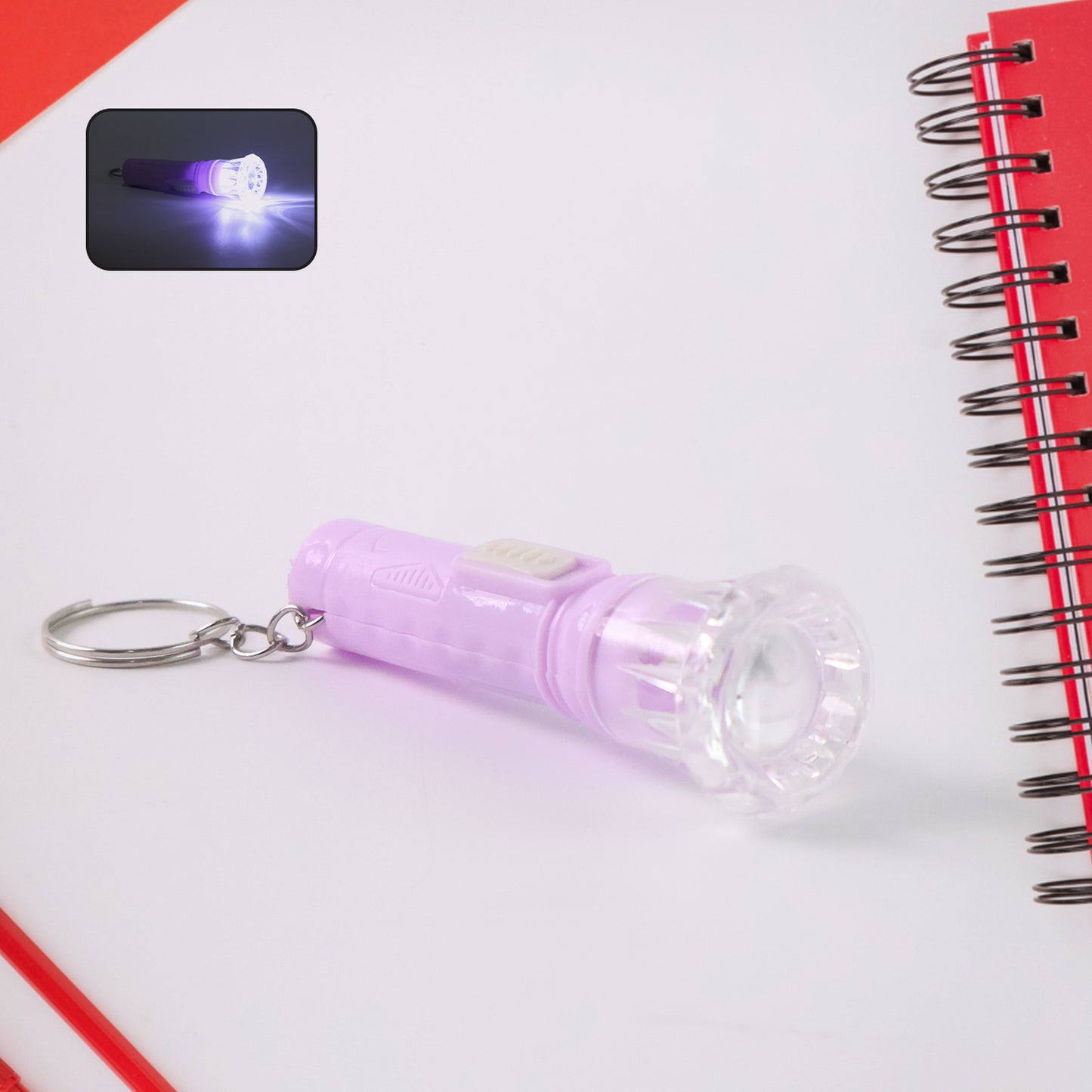 Wukusy mini LED flashlight keychain torch in mixed colors, compact toy with bright light, attached keychain for portable use