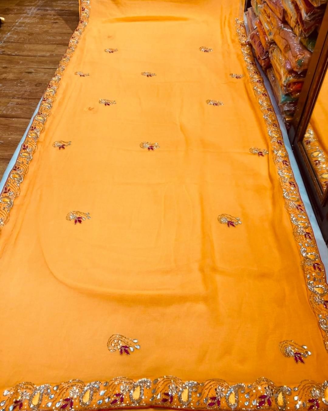Women's saree with embroidery cording and sequin work from Drpshippr, featuring intricate embellishments and traditional design.