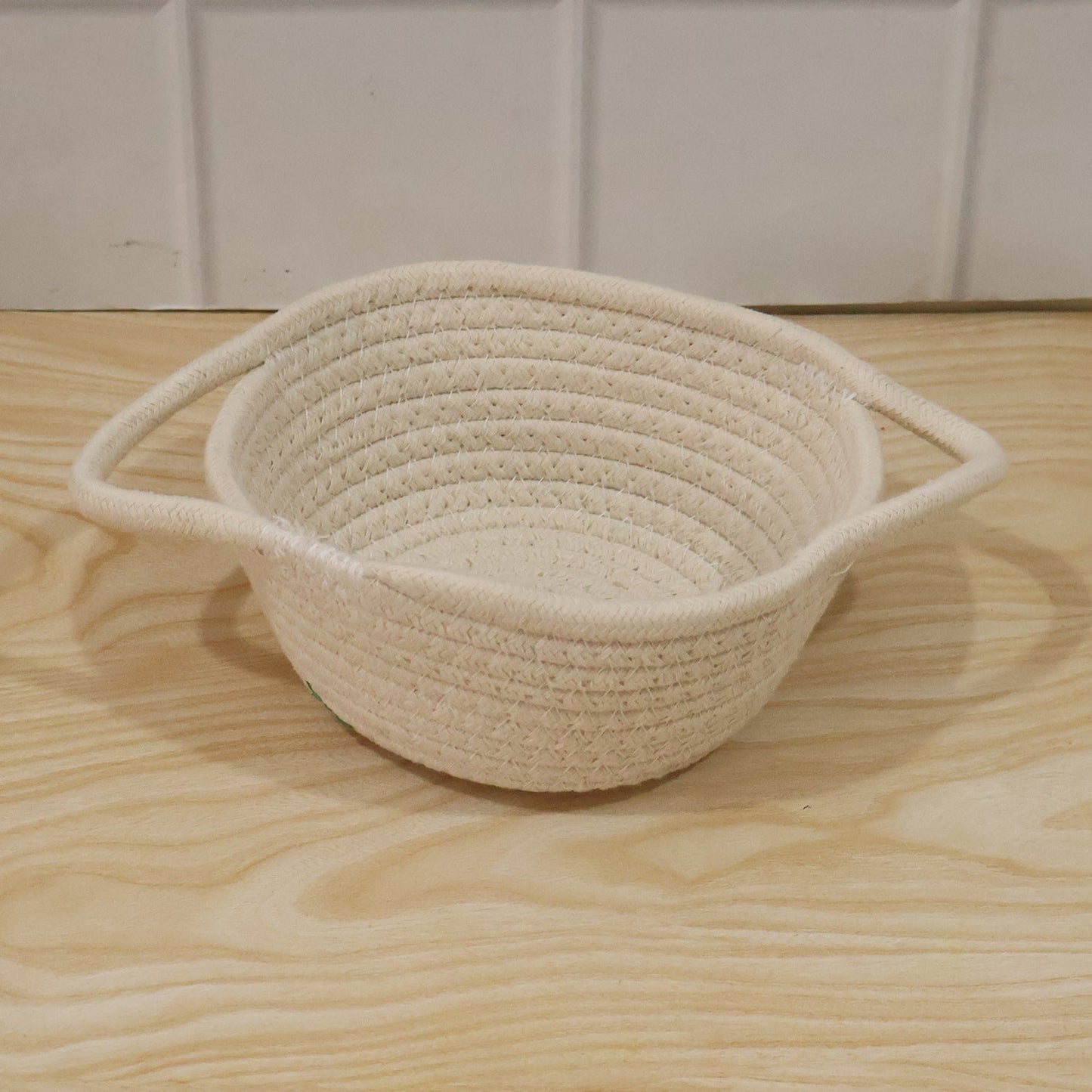 Wukusy cotton rope woven storage basket with handles, ideal for organizing toys and household items.