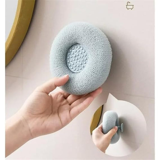 Round loofah scrubbing brush from FIZZI SHOP with textured natural fibers for gentle exfoliation and cleaning.