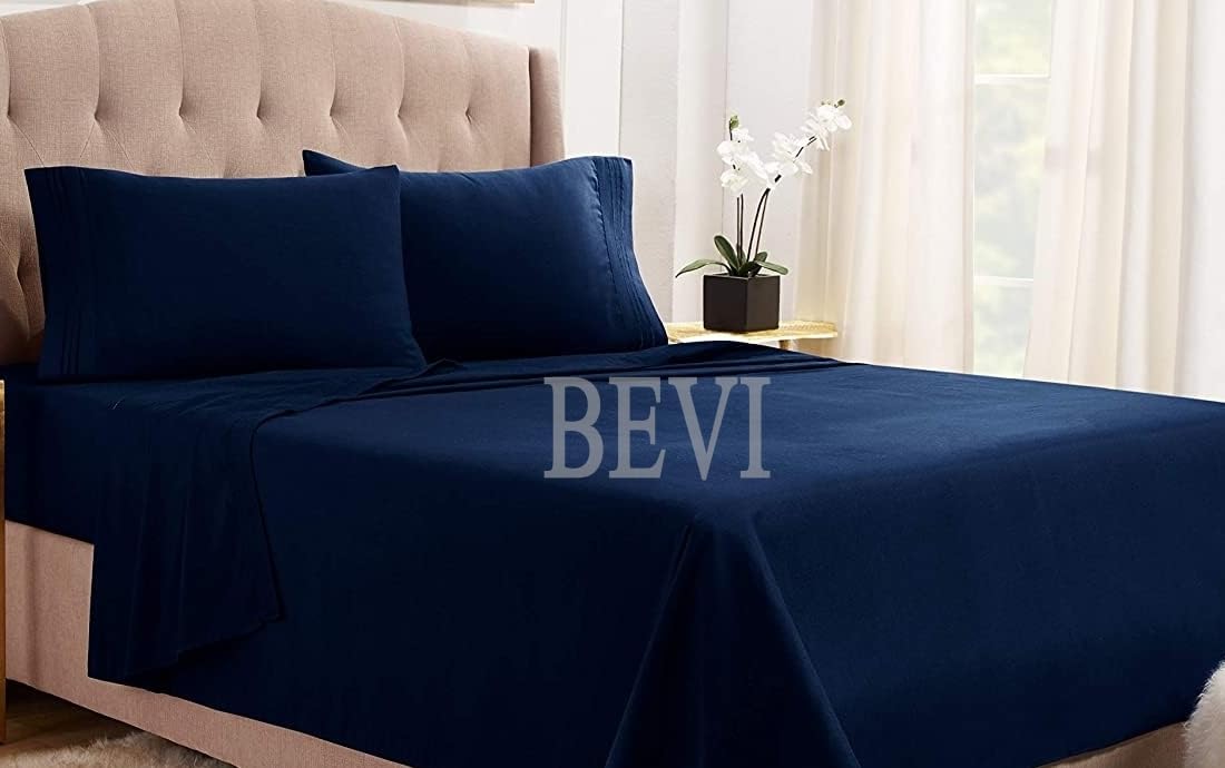 Navy blue Seasons double bedsheet with two matching pillow covers from FIZZI SHOP, made of soft, comfortable fabric.
