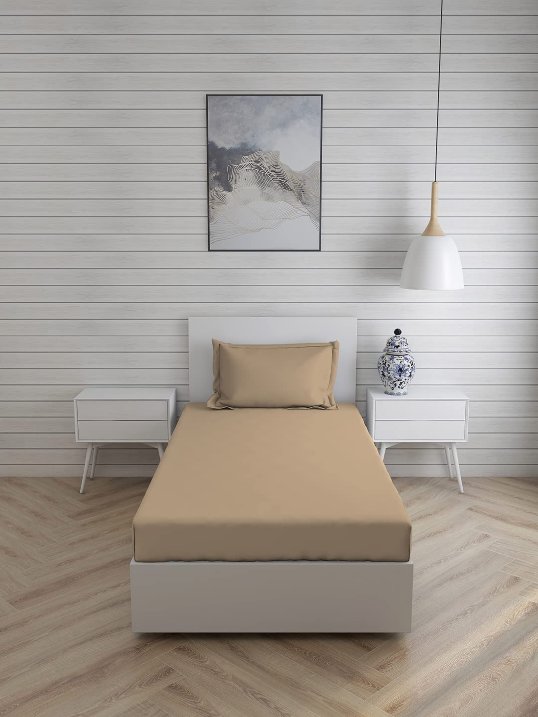 Beige plain bedsheet with one matching pillow cover from FIZZI SHOP, soft fabric with simple, elegant design.