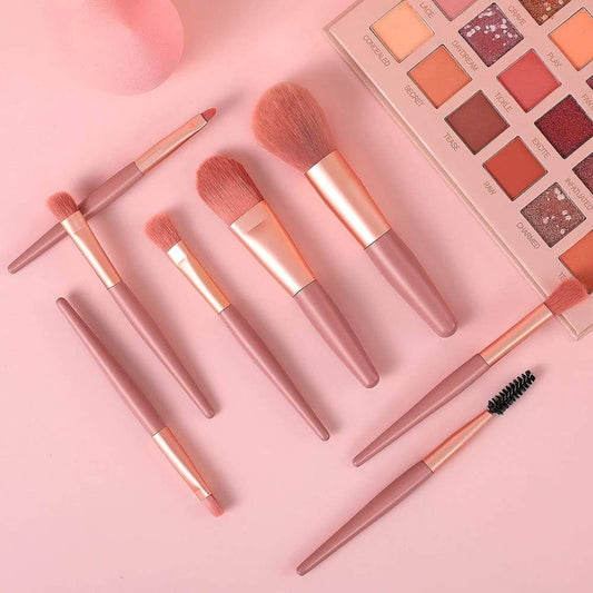 Wukusy 1460 mini makeup brush set with 8 portable cosmetic brushes including foundation, blush, eyeshadow, and lipstick brushes.