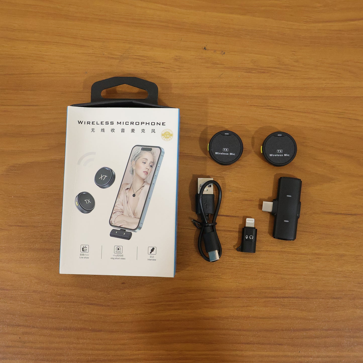 Wukusy portable wireless lavalier microphone set with dual clip-on microphones, ideal for recording and broadcasting.