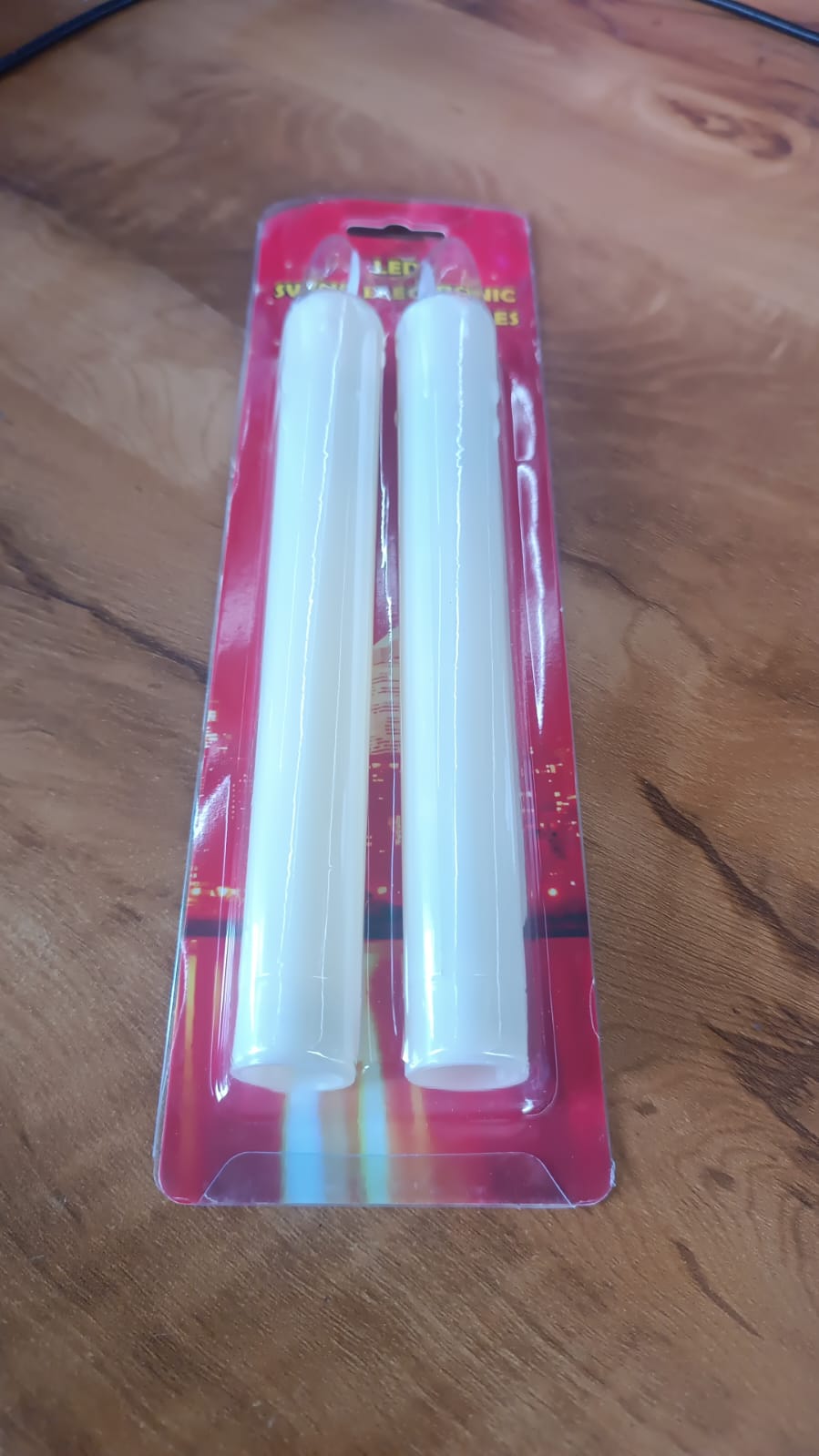 Set of 2 Wukusy LED flameless taper candles for home decor, showing elegant black candle holders with flickering warm light.
