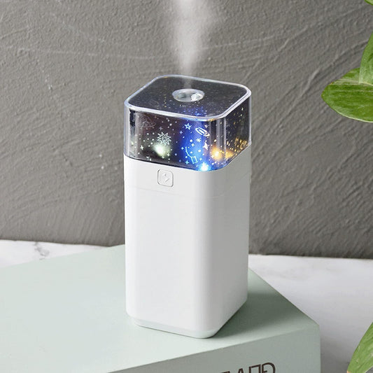 Wukusy 0221 star night light projector humidifier with LED lights, ultrasonic mist, and compact design for kids' rooms and home use.