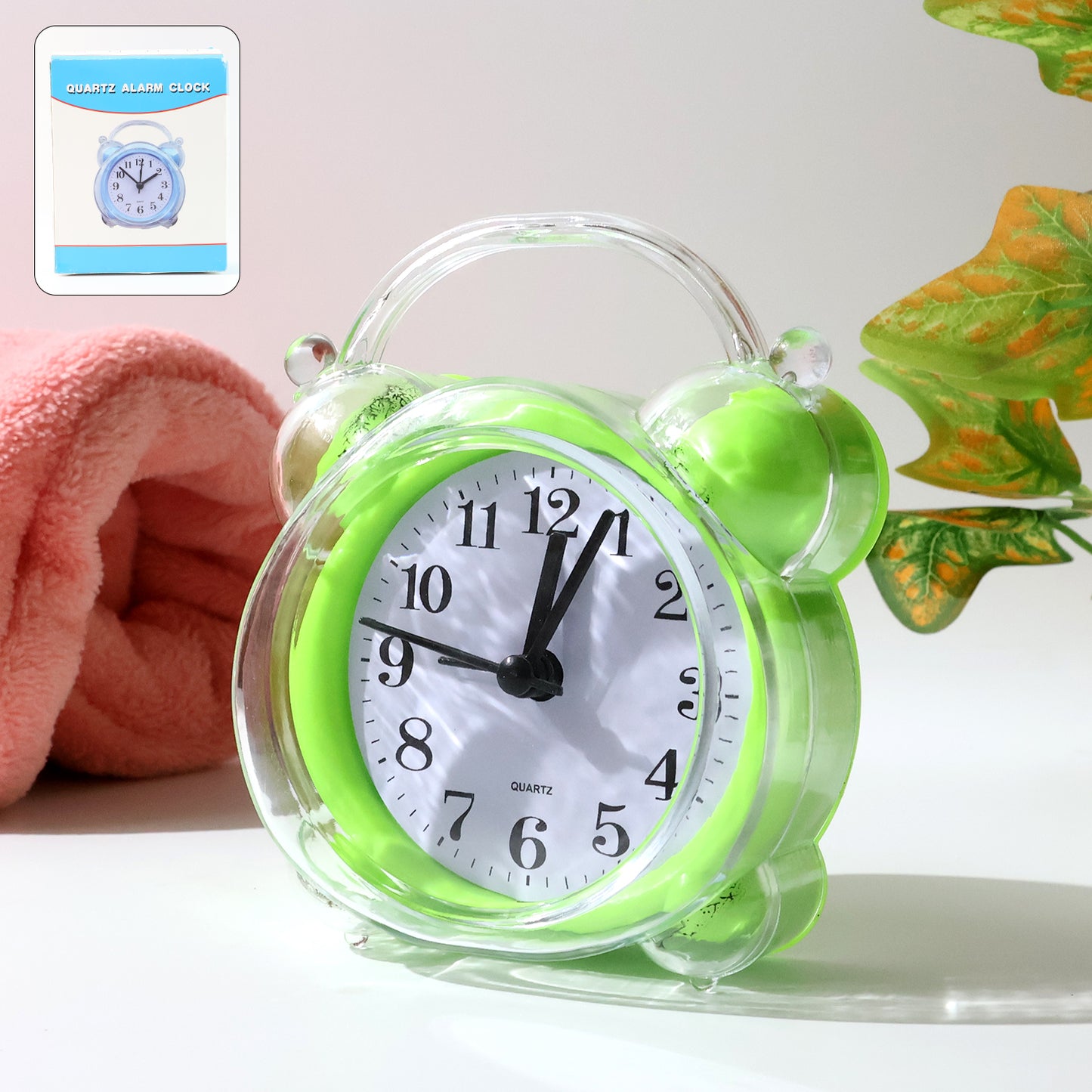 Wukusy Classic Quartz Alarm Clock displaying time with round face and black hour and minute hands on a white background.