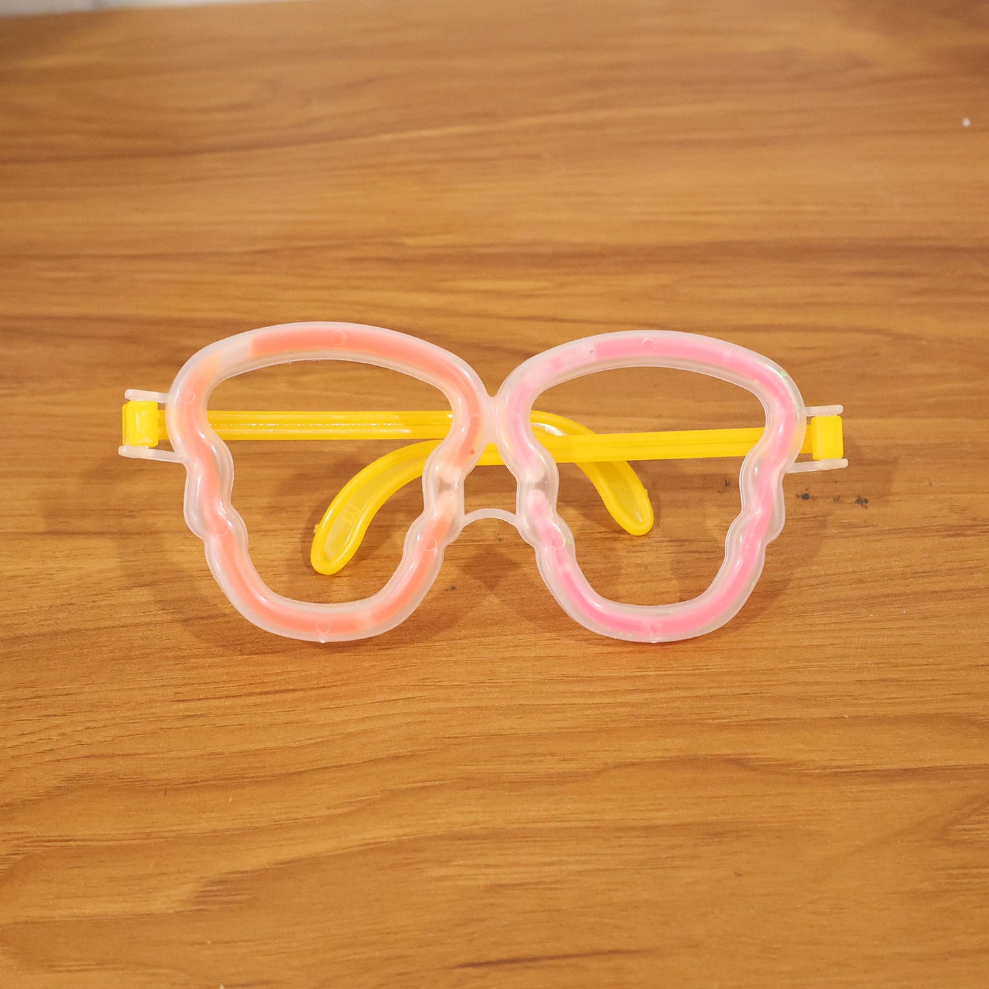 Glow party glasses for kids and adults by Wukusy, featuring colorful, illuminated eyewear for fun celebrations and events.