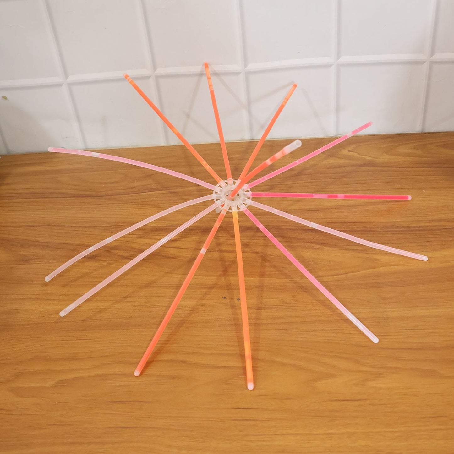 Wukusy Dark Glow Chakdol toy set with 13 glow sticks, featuring colorful glow-in-the-dark spinning disks and accessories for kids