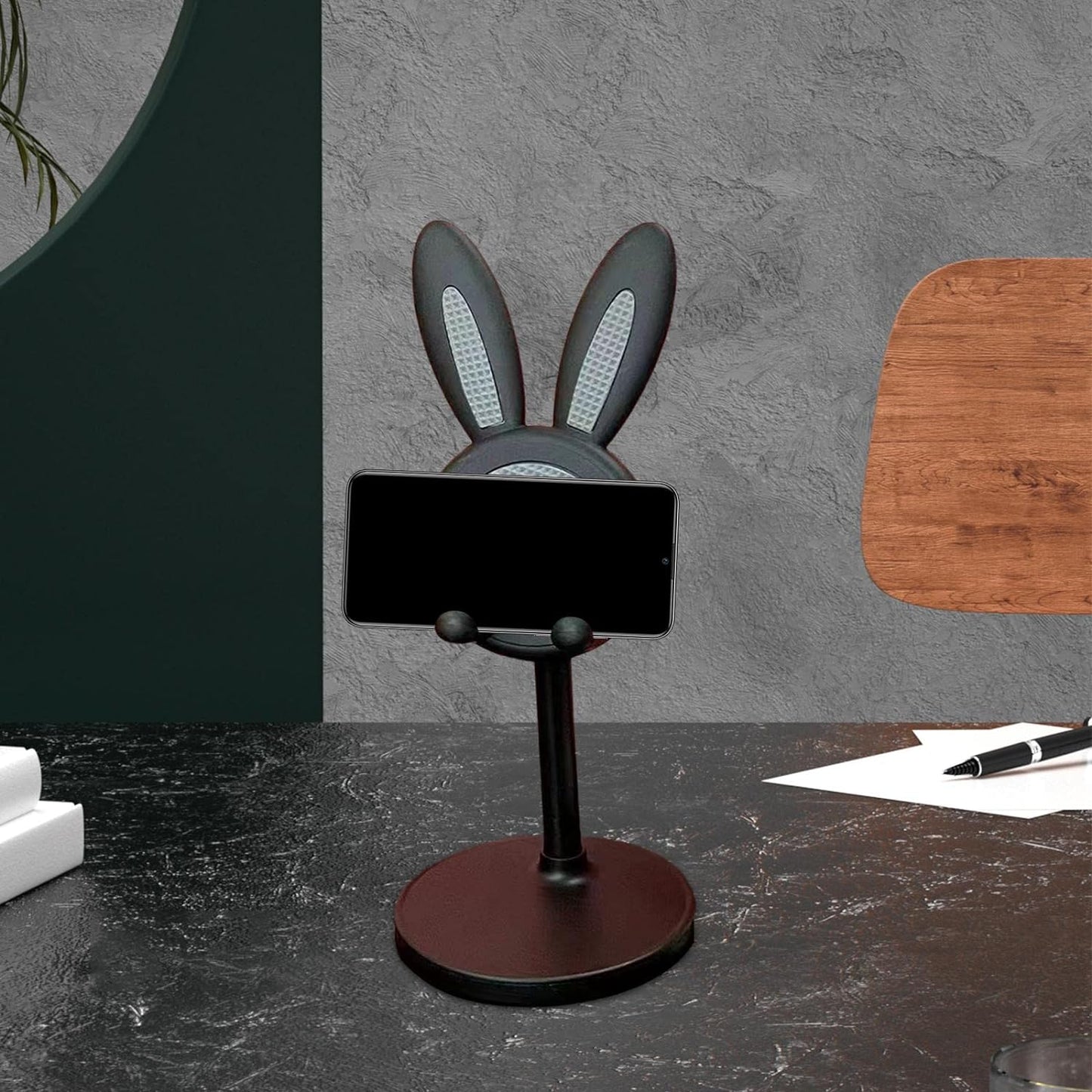 Cute Wukusy bunny-shaped phone stand with adjustable angle, ideal for desks and Easter gifts, suitable for phone and tablet use.