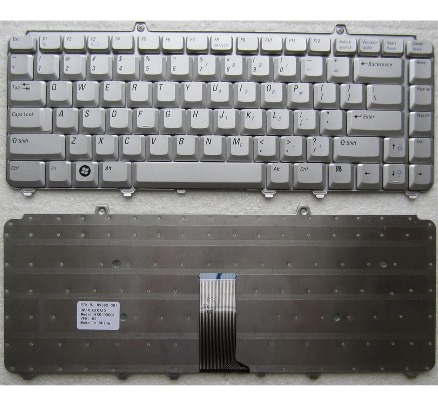 Seasons silver Dell XPS M1330 laptop internal keyboard, full QWERTY layout with function keys, viewed from above.