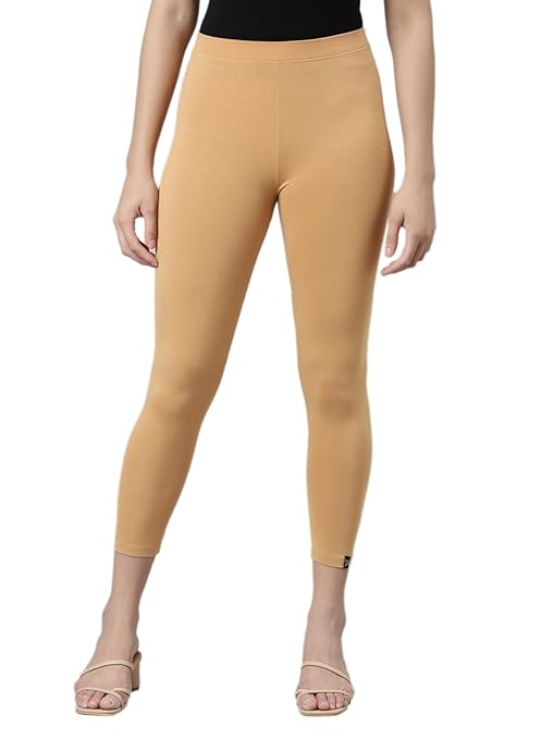 FIZZI SHOP mustard skinny fit high ankle length leggings, close-up of the fitted legging style and ankle-length design.