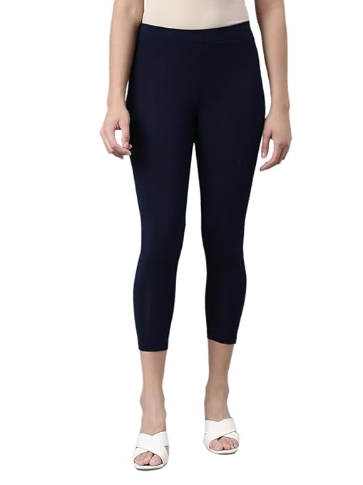 Navy skinny fit high ankle length leggings by FIZZI SHOP, showing close-up of fitted stretch fabric and ankle design.