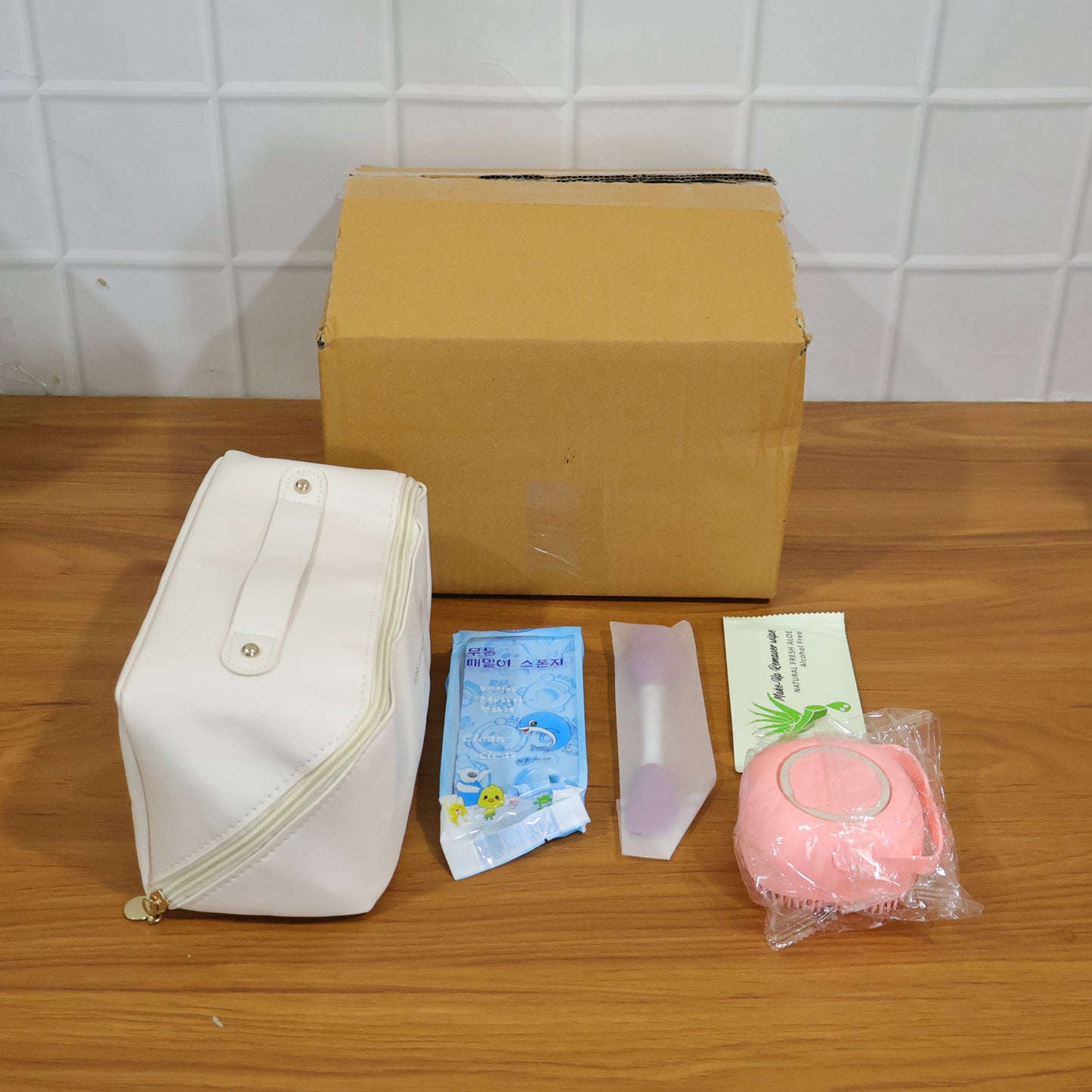 Wukusy premium women travel hygiene essentials set including toiletries in a compact bag, ideal for on-the-go personal care.