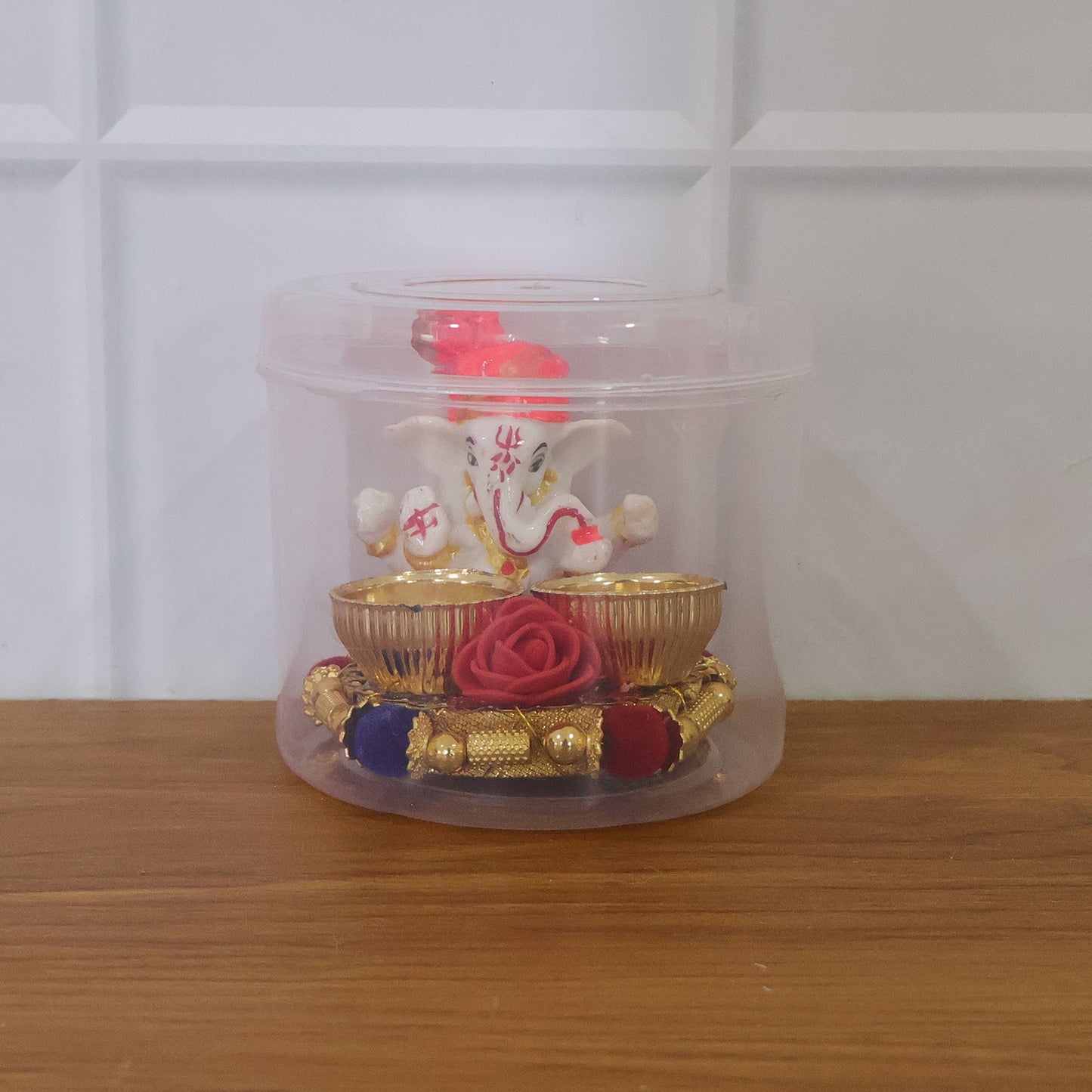 Decorative Lord Ganesha Pooja Thali set by Wukusy with intricate designs, featuring a Ganesha idol and traditional puja accessories.