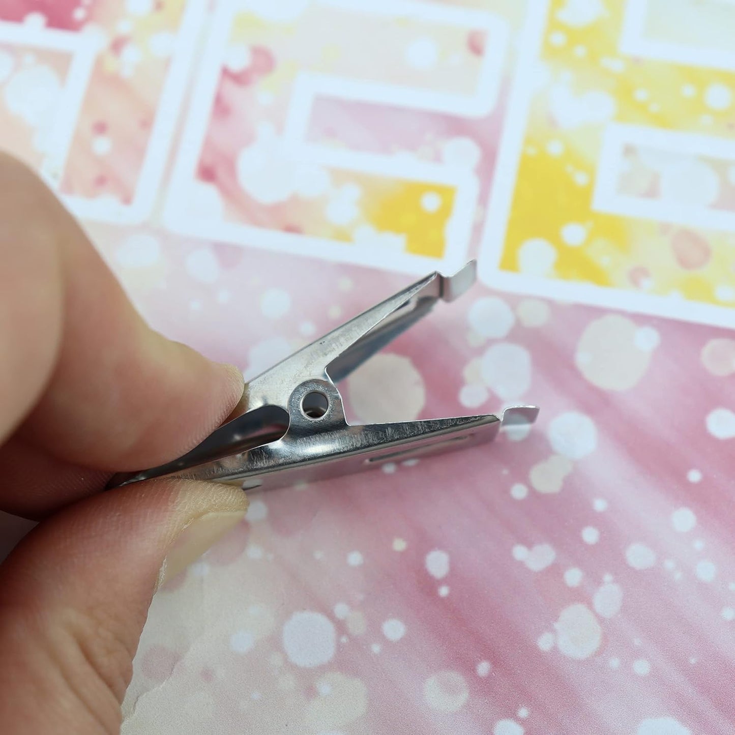 Set of 20 stainless steel cloth drying pins or clips from Wukusy, ideal for hanging clothes to dry.