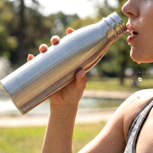 Wukusy 1000ml stainless steel water bottle for home and kitchen, featuring a sleek, durable design with a secure lid.