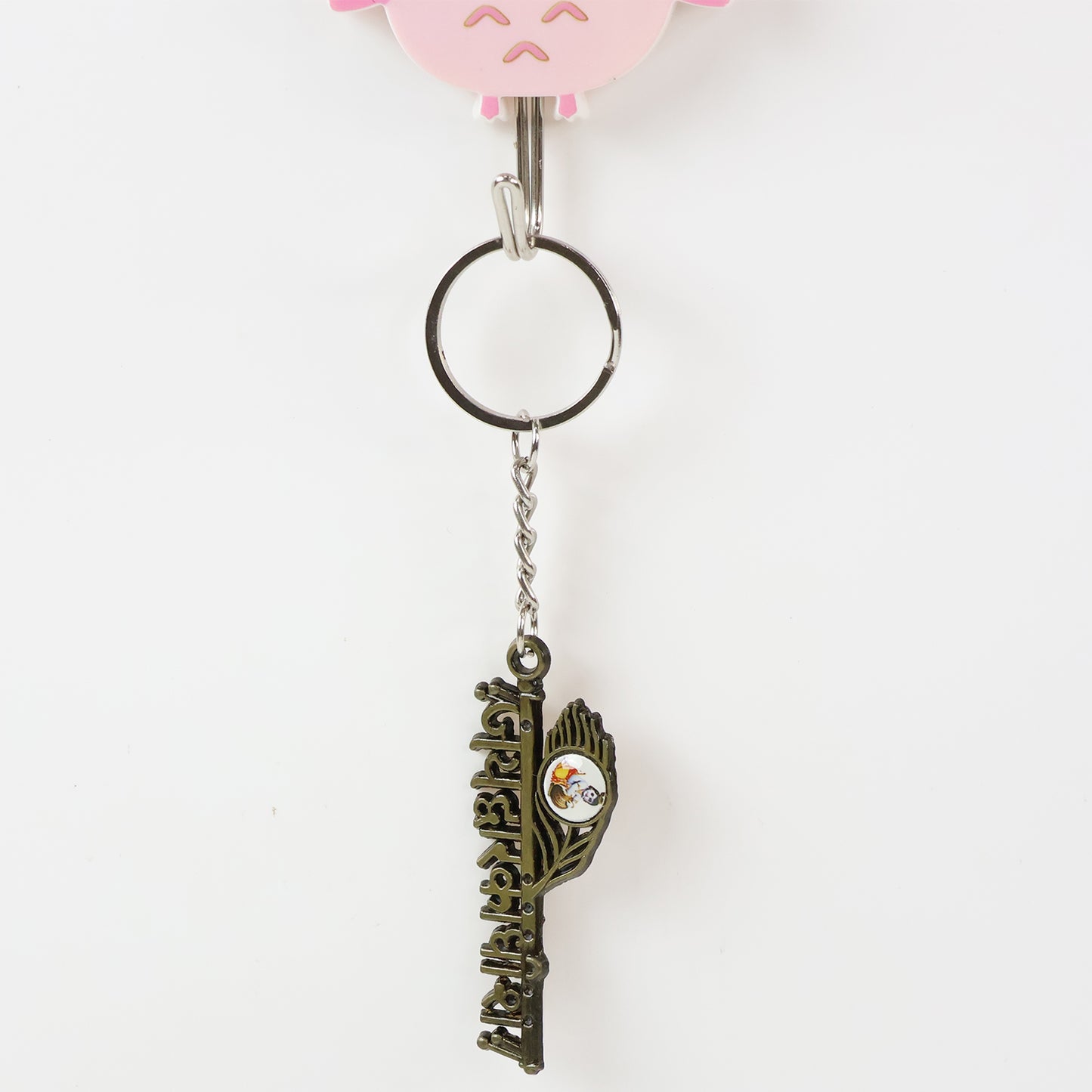 Wukusy Jai Dwarkadhish metal keychain featuring intricate design, ideal for religious or decorative use.