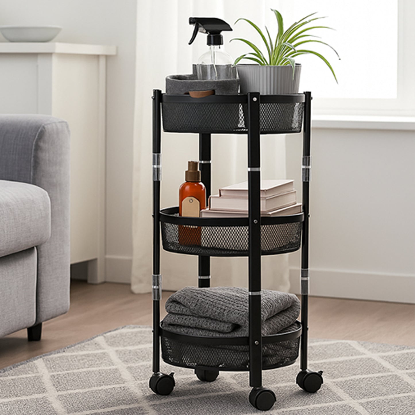 Wukusy 3-layer round metal mesh utility storage trolley with wheels, ideal for home organization and improvement projects.