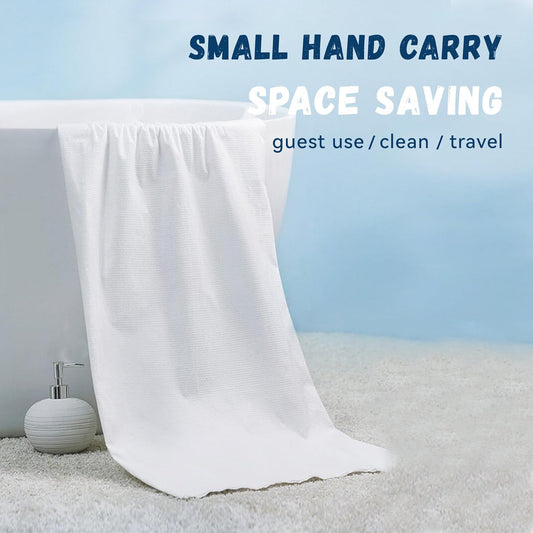 Wukusy compressed travel bath towel, 70x100 cm, unfolded displaying soft, quick-drying fabric ideal for travel and outdoor use.