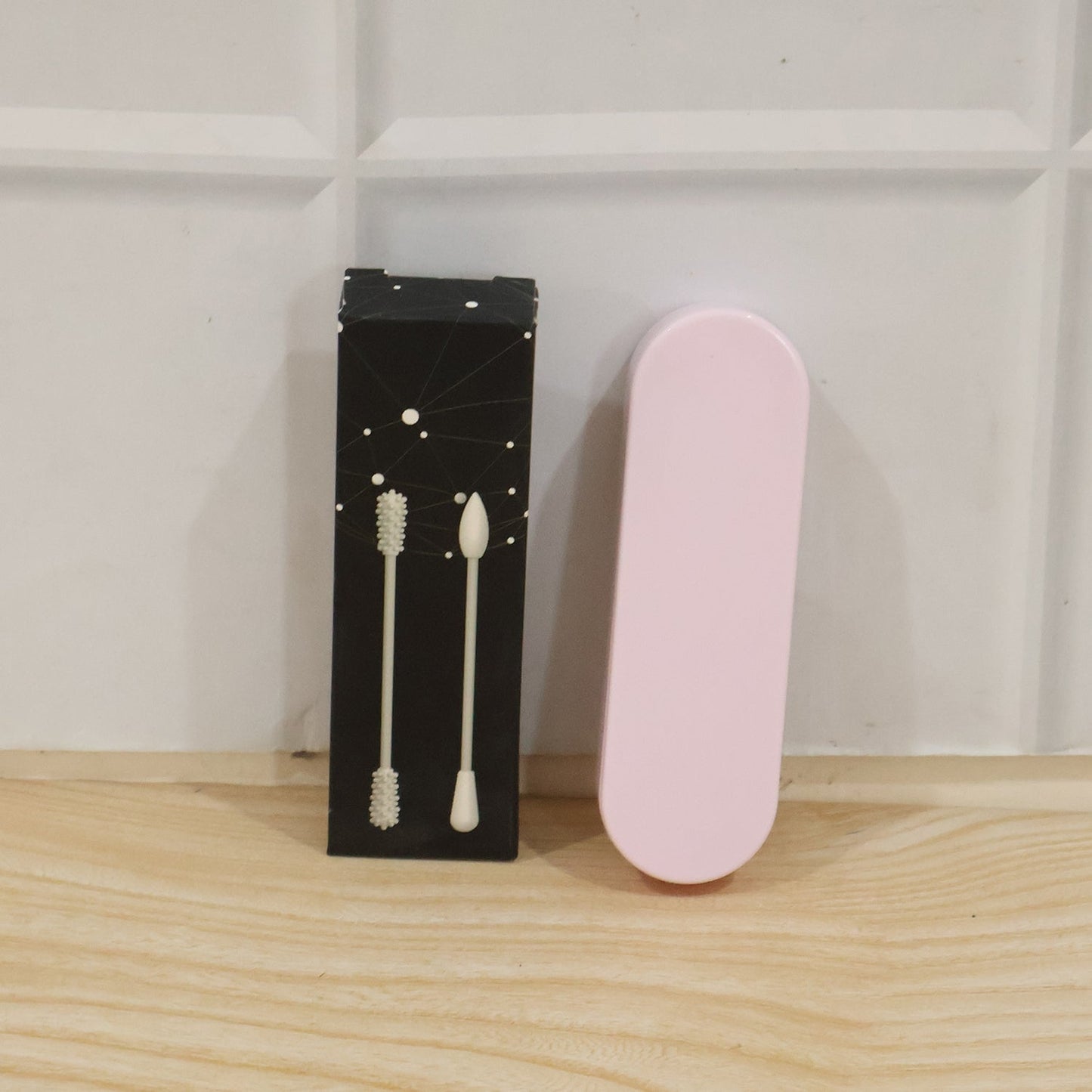 Wukusy 4-in-1 reusable silicone ear swab set with case, washable ear buds for safe ear cleaning and hygiene.