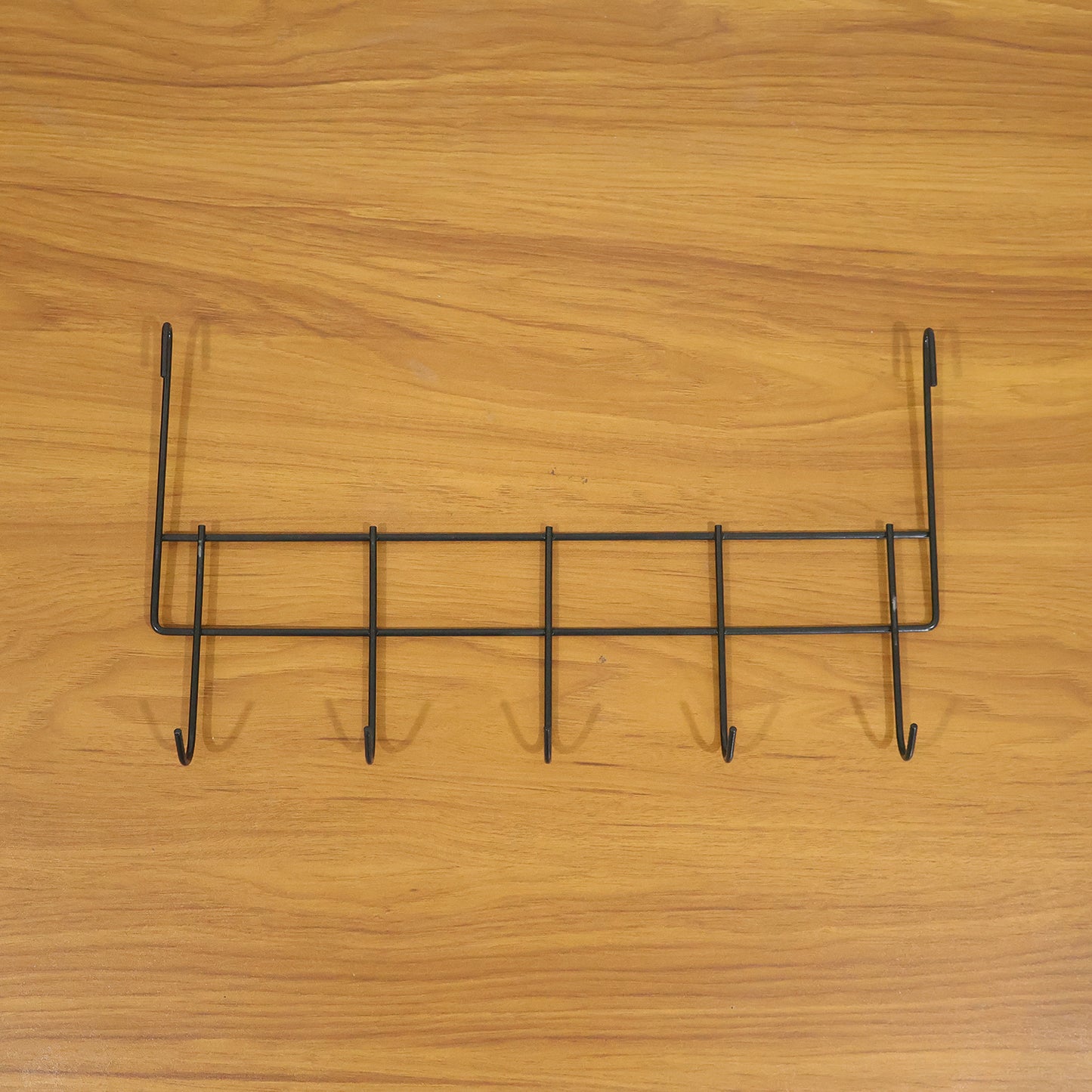 Wukusy premium over-the-door metal hook rack with five hooks for hanging coats, hats, and accessories in a home or office.
