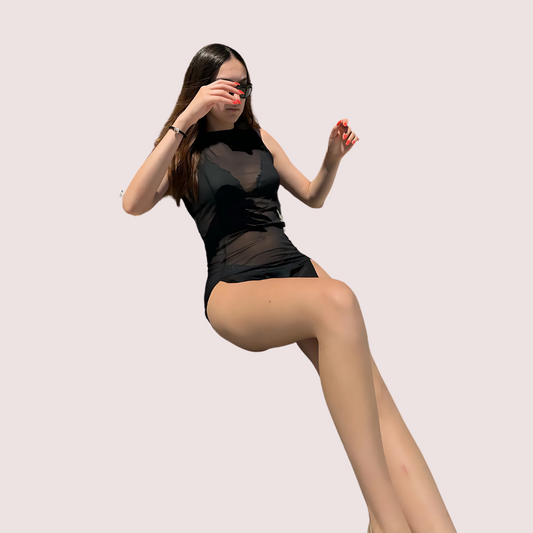 Snazzyway Maison Allure sheer black mini dress with dual open slits, lightweight fabric, and stylish fit for evening wear.