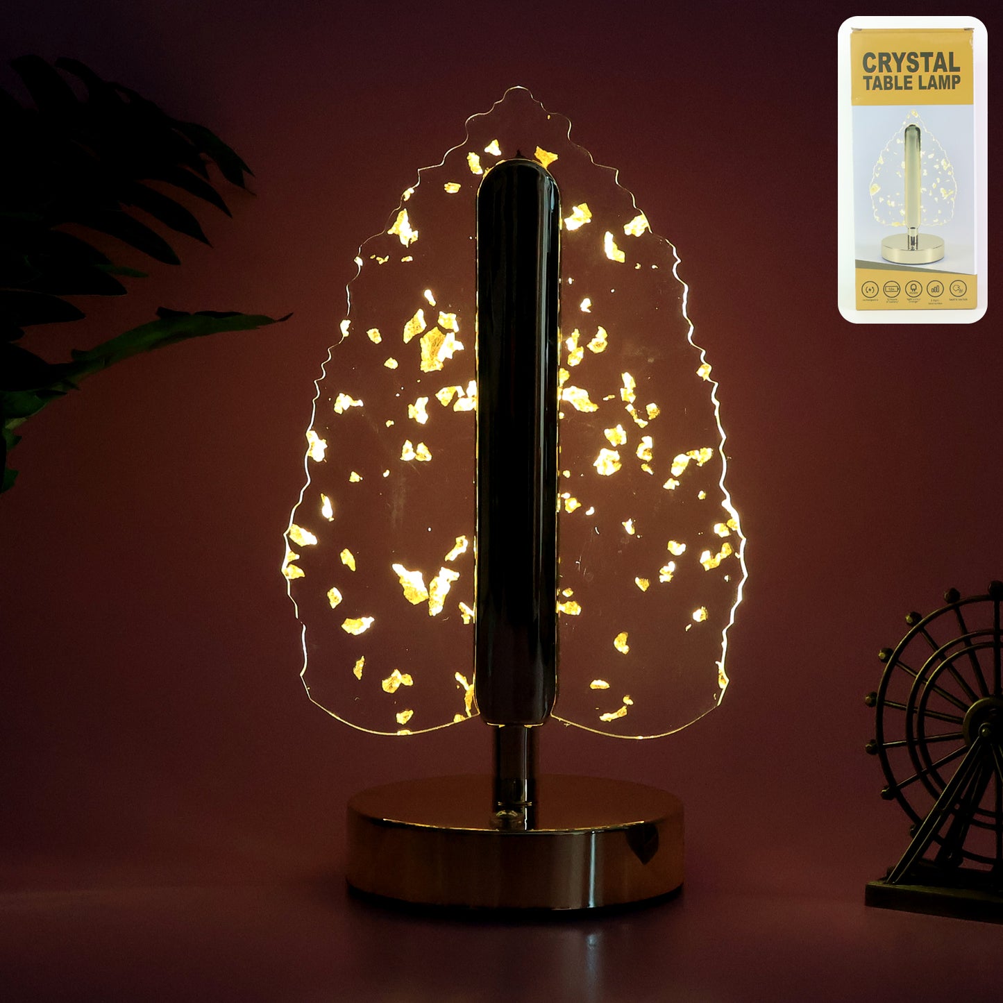 Golden crystal leaf-shaped LED table lamp by Wukusy, elegant home decor with warm lighting and intricate leaf design.