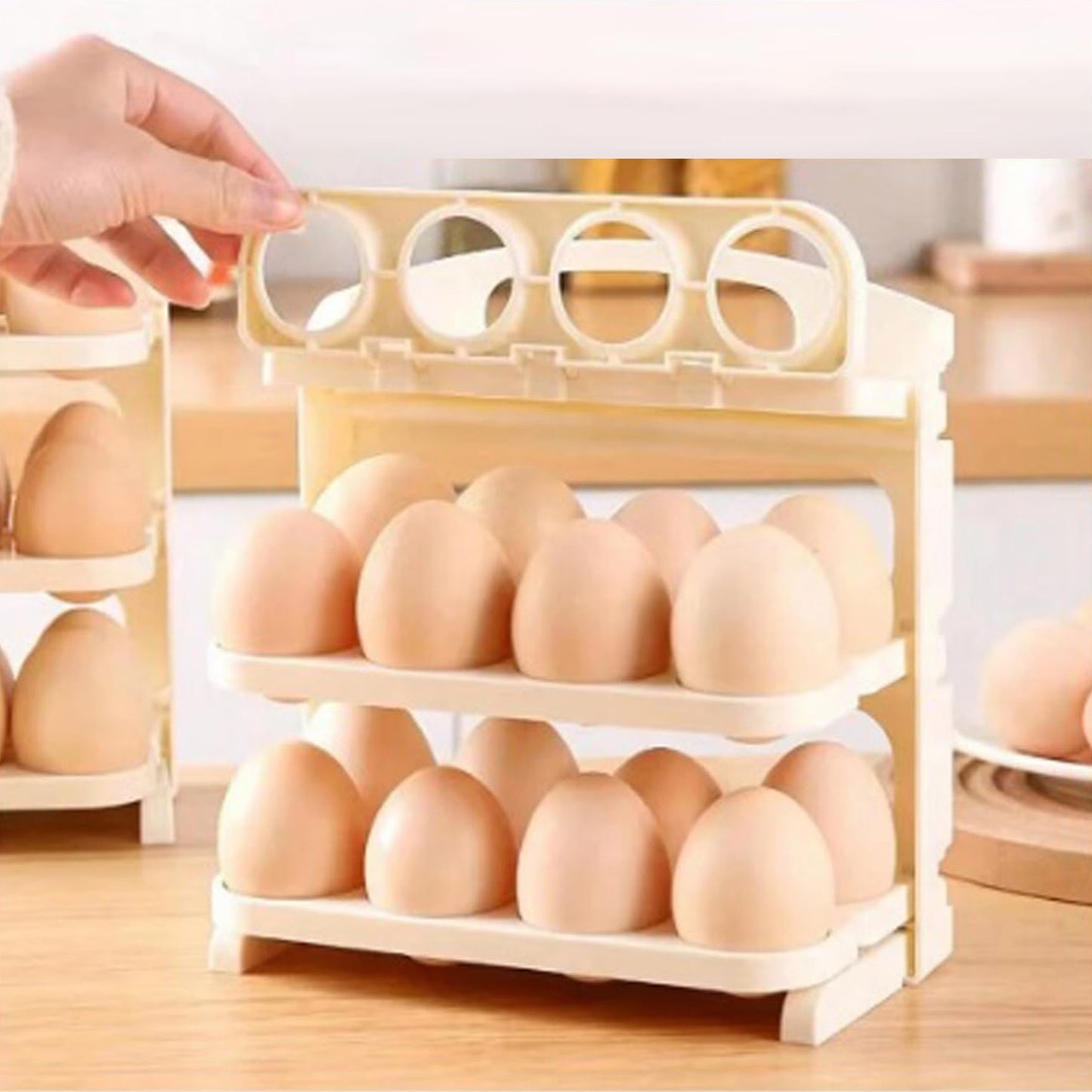 Plastic foldable egg tray by Wukusy with 24 grid storage box for organizing eggs in the kitchen.
