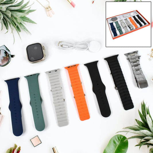 Wukusy 7-in-1 smart watch combo with seven classic straps and transparent screen guard, featuring a sleek digital watch display.