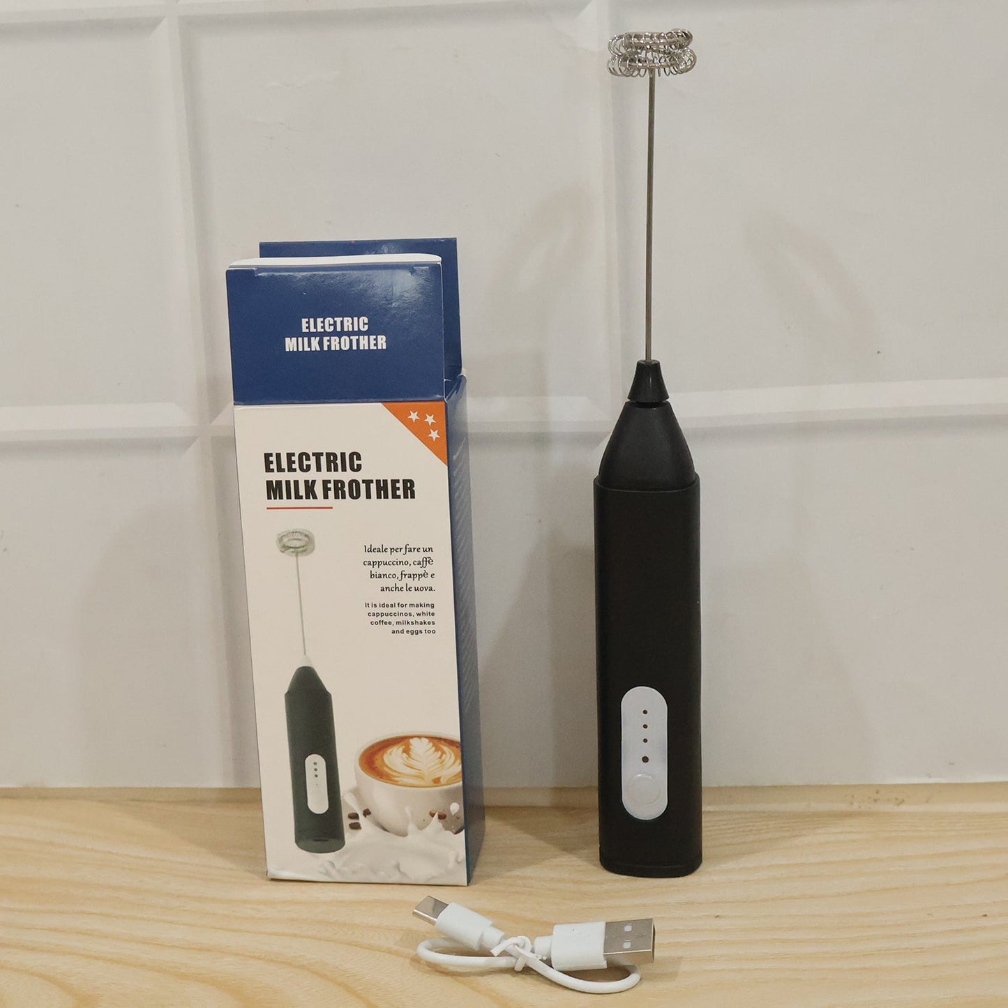 Wukusy handheld electric milk frother and coffee foam maker with stainless steel whisk for creating frothy drinks.