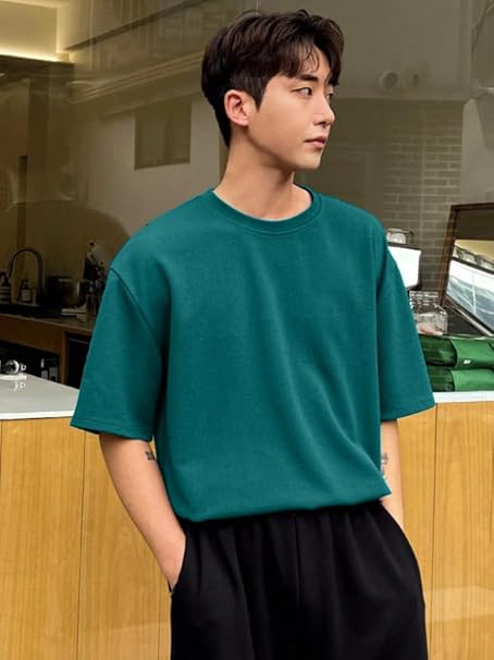 Men's dark green round neck T-shirt from Seasons, made of soft blended fabric, shown on a plain background.