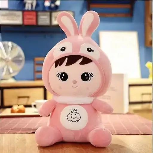 Pink plush stuffed doll by Ekom wearing a bunny cap, soft toy perfect for kids and girls, cuddly and adorable for play and cuddling.