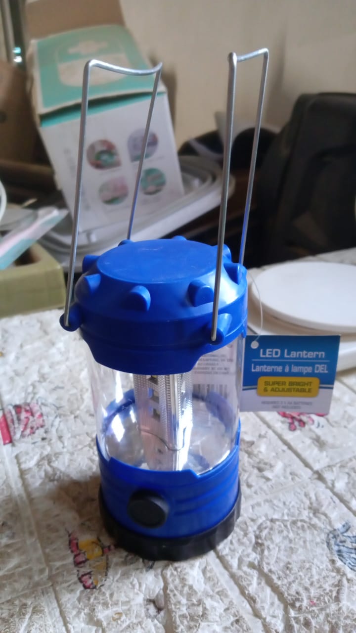 Wukusy camping lantern with white light, waterproof, portable, lightweight, battery-operated tent light for hiking and outdoor camping.