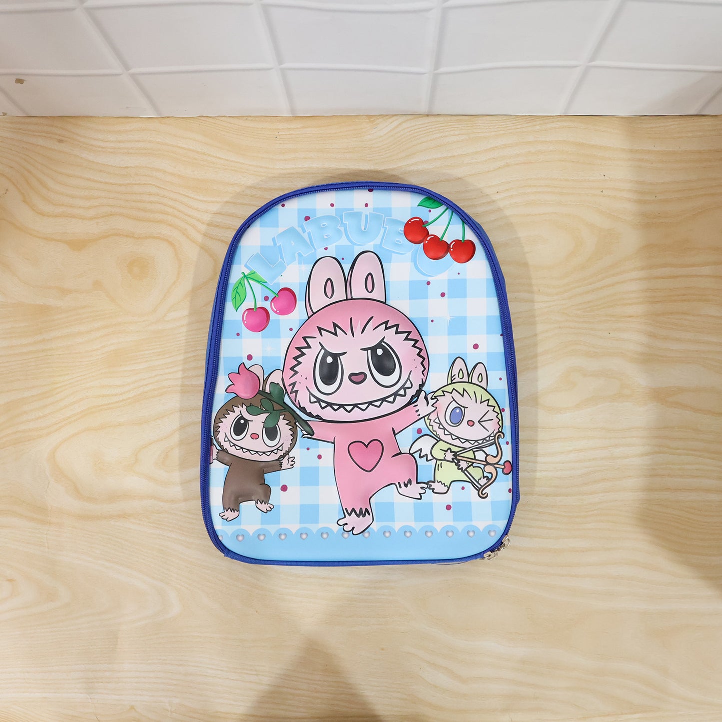 Colorful cartoon printed kids school backpack by Wukusy featuring a 12-inch design with fun character illustrations