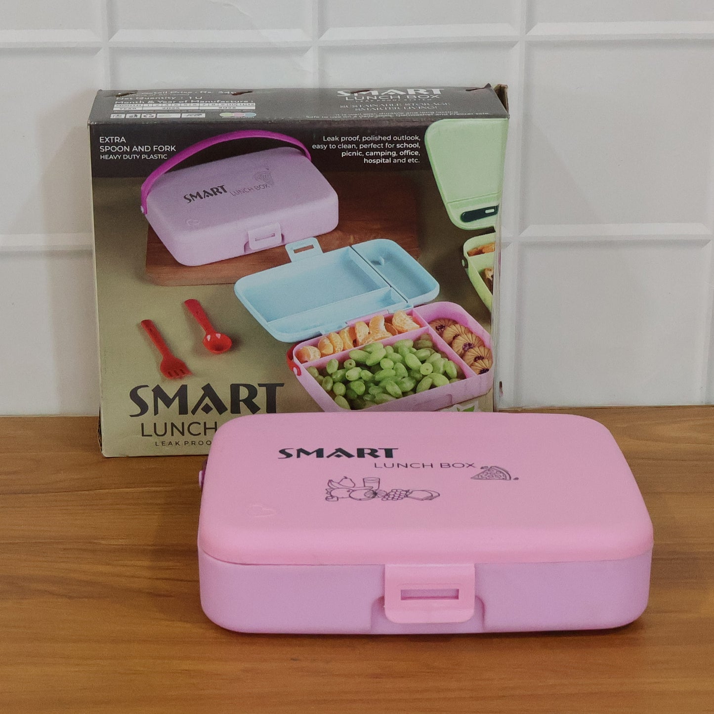 Wukusy leak-proof lunch box with three compartments and spoon set, featuring a durable plastic container for meal storage.