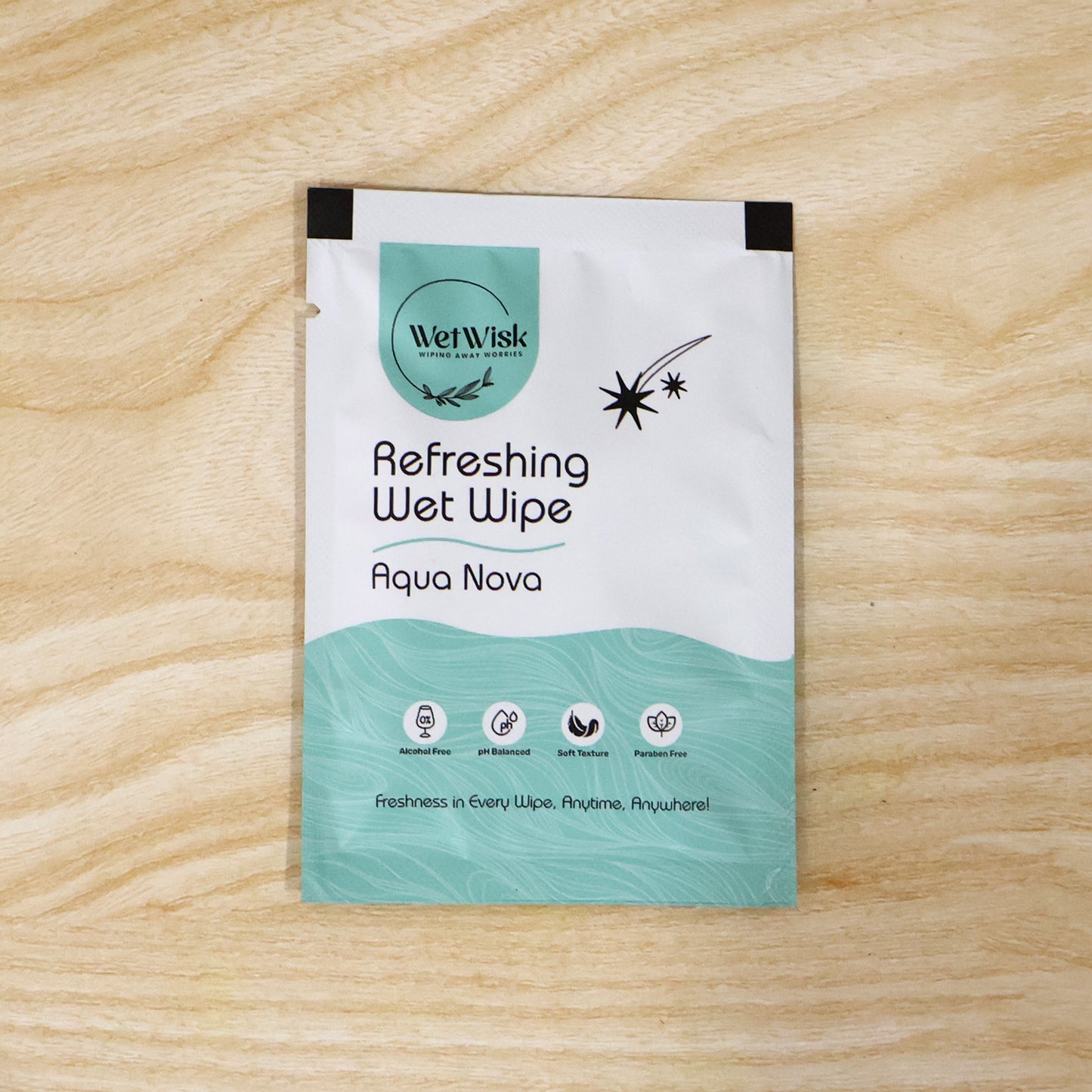 Wukusy Aqua Nova refreshing wet wipe for face, hands, and body, showing the moist cleansing wipe in a clean, open package.