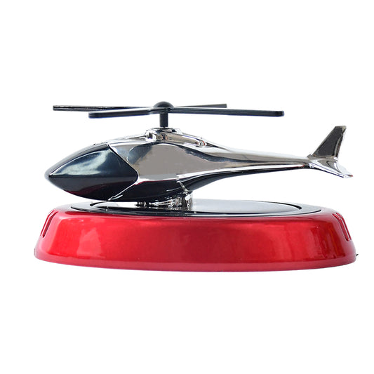 Wukusy solar-powered rotating helicopter car air freshener hanging from a car interior, featuring a colorful helicopter design.