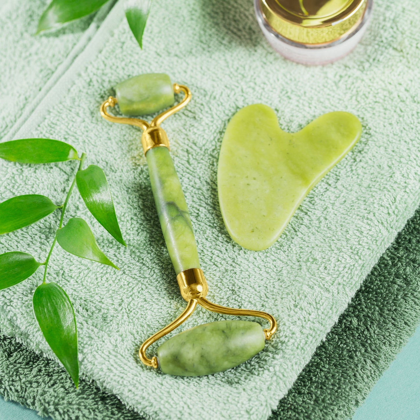 Wukusy Gua Sha stone and jade roller set for face massage, natural skincare tools for glowing skin and anti-aging facial massage.